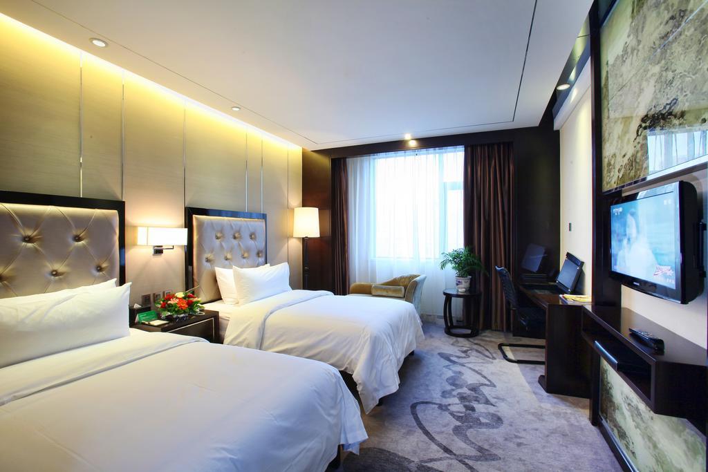 Xichang Minshan Hotel Zimmer foto